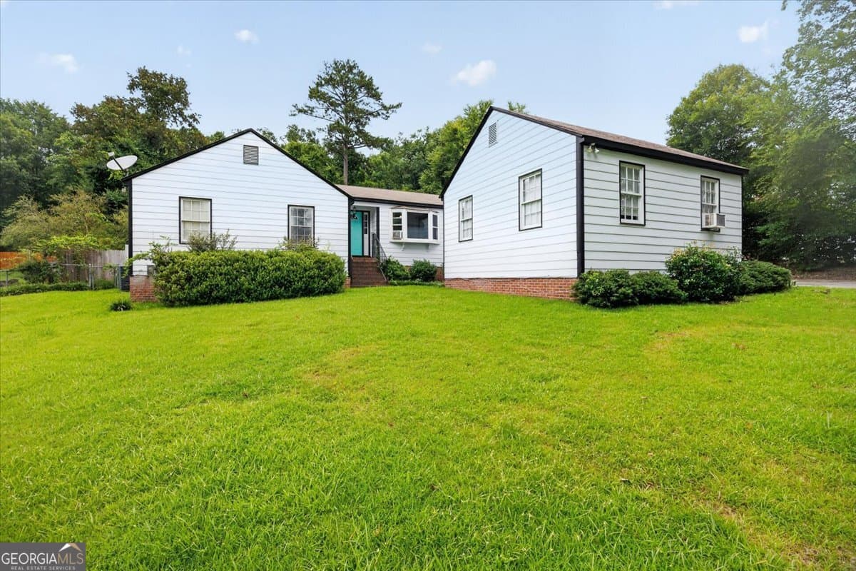 4 bedroom, 1.5 bathroom, 1,976 sq ft single family residence for sale at 6603 Dana Drive, Macon, GA 31220 — photo 1 of 28