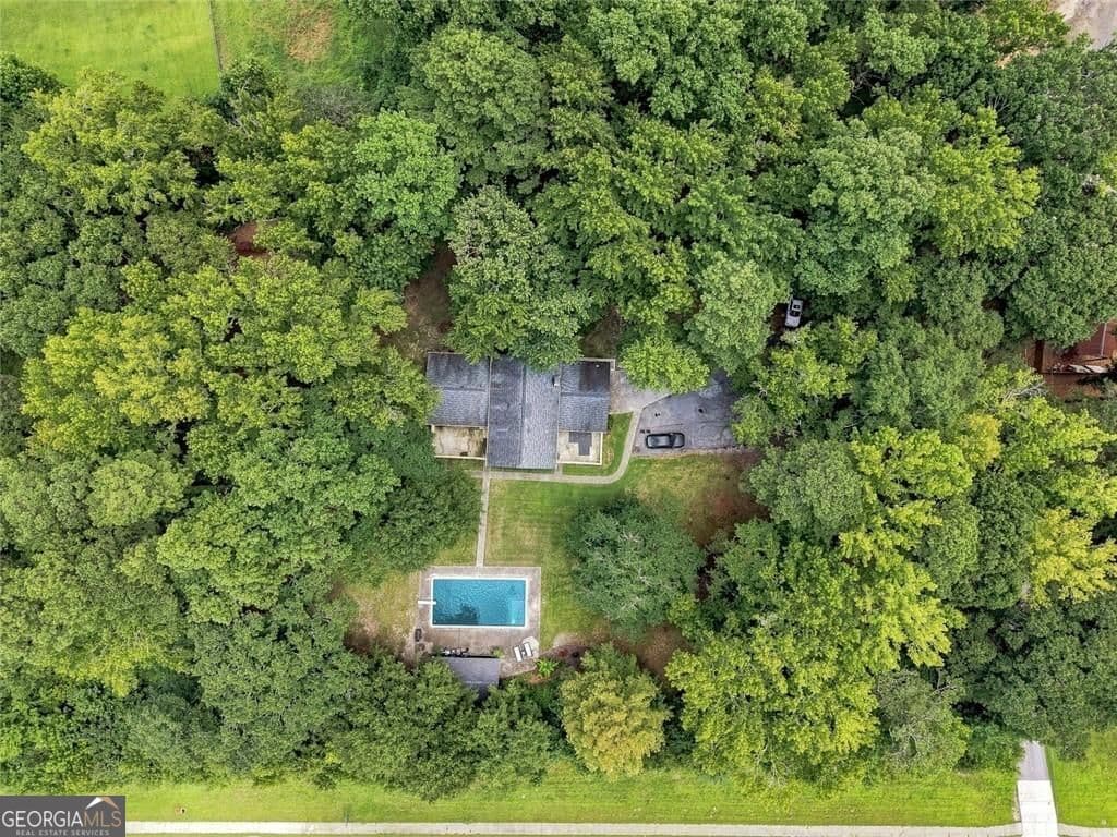 4 bedroom, 3 bathroom, 3,880 sq ft single family residence for sale at 3806 Loganville Highway, Loganville, GA 30052 — photo 3