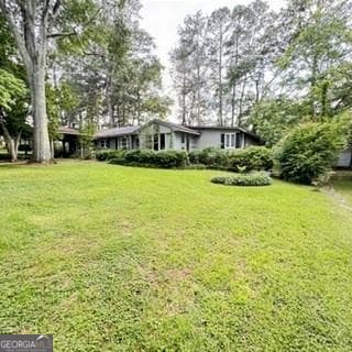 4 bedroom, 2.5 bathroom, 2,631 sq ft single family residence for sale at 207 Iris Drive, Centre, AL 35960 — photo 2