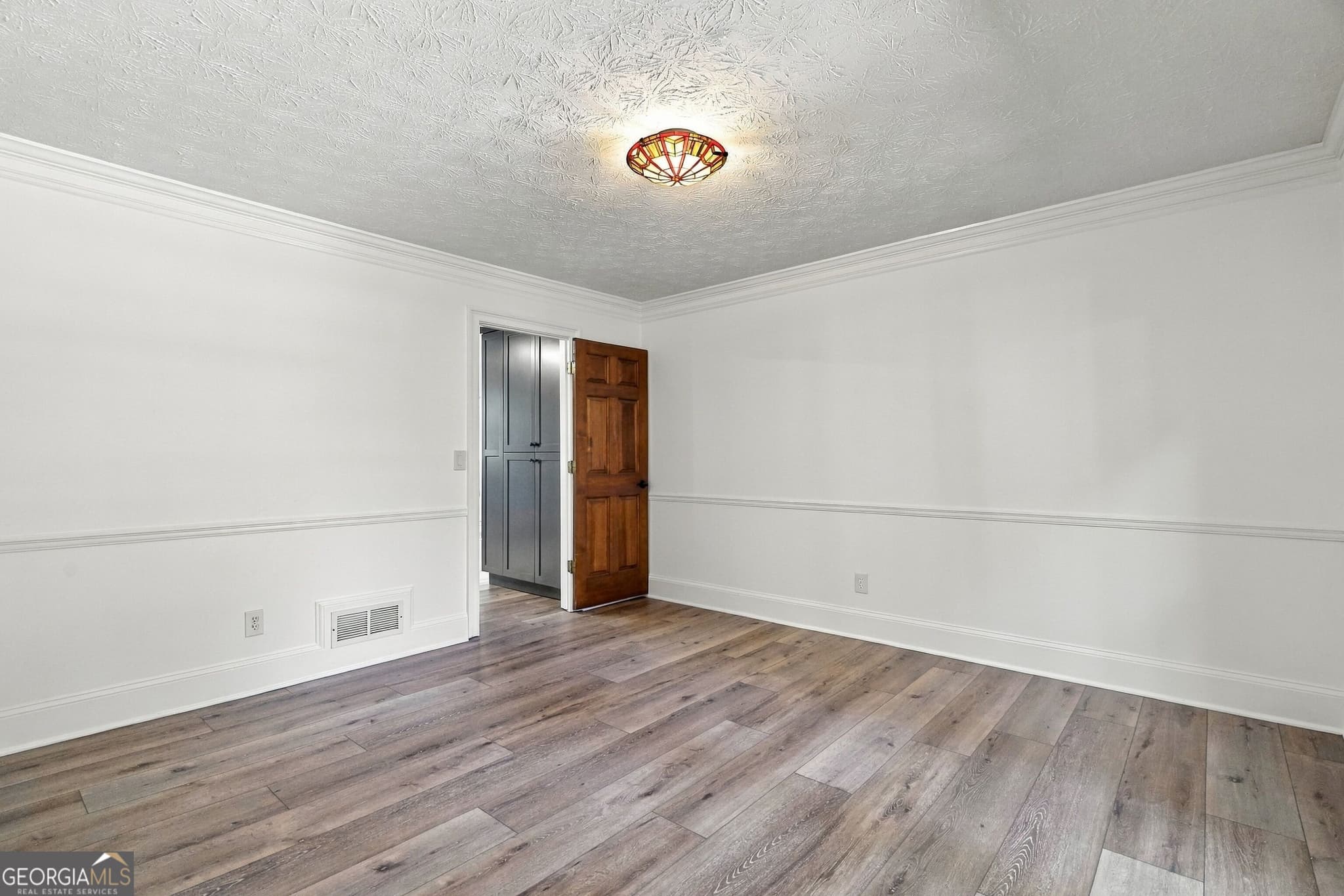 5 bedroom, 3.5 bathroom, 3,548 sq ft single family residence for sale at 4690 Nutmeg Way, Lilburn, GA 30047 — photo 6