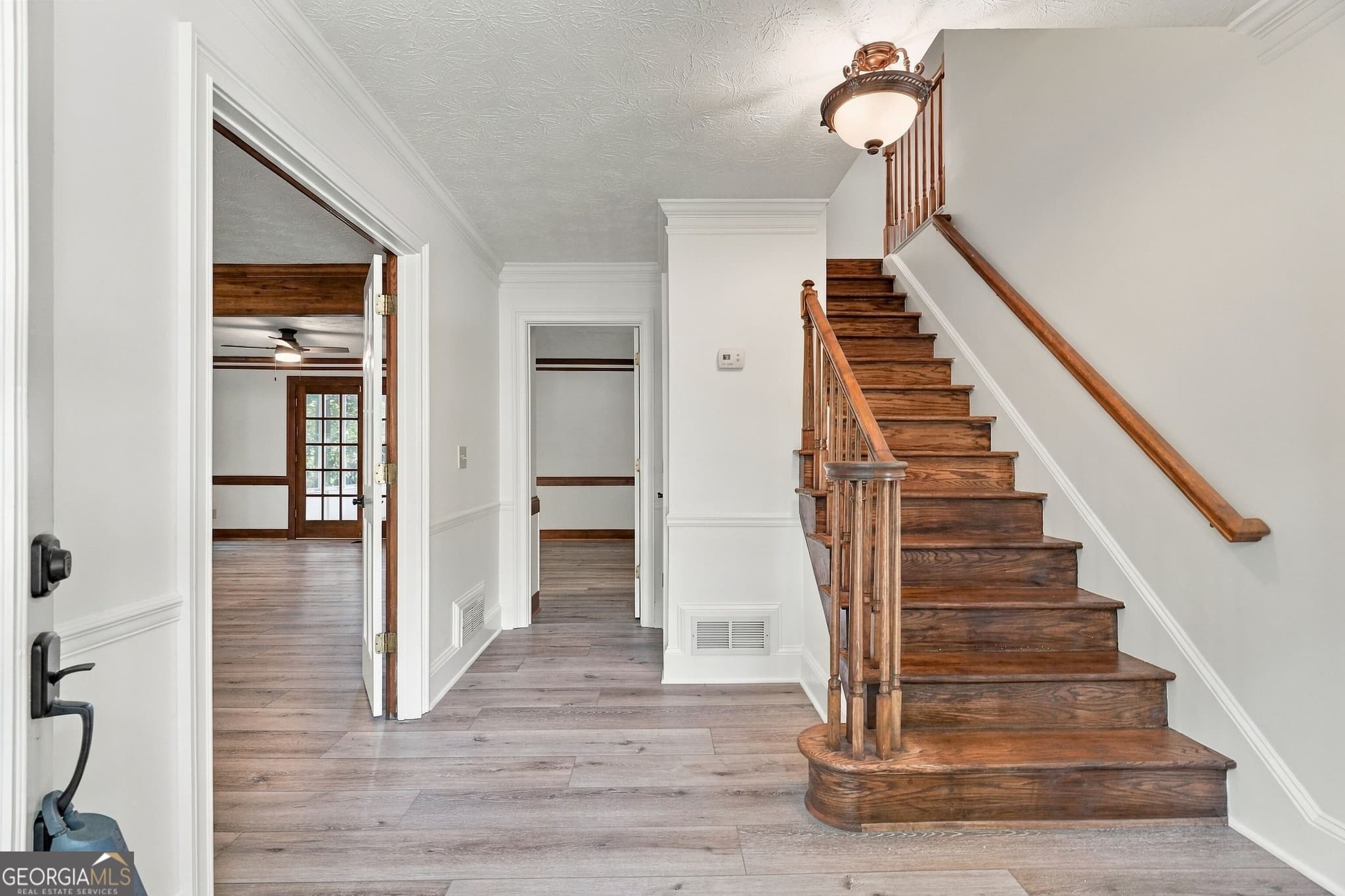 5 bedroom, 3.5 bathroom, 3,548 sq ft single family residence for sale at 4690 Nutmeg Way, Lilburn, GA 30047 — photo 3