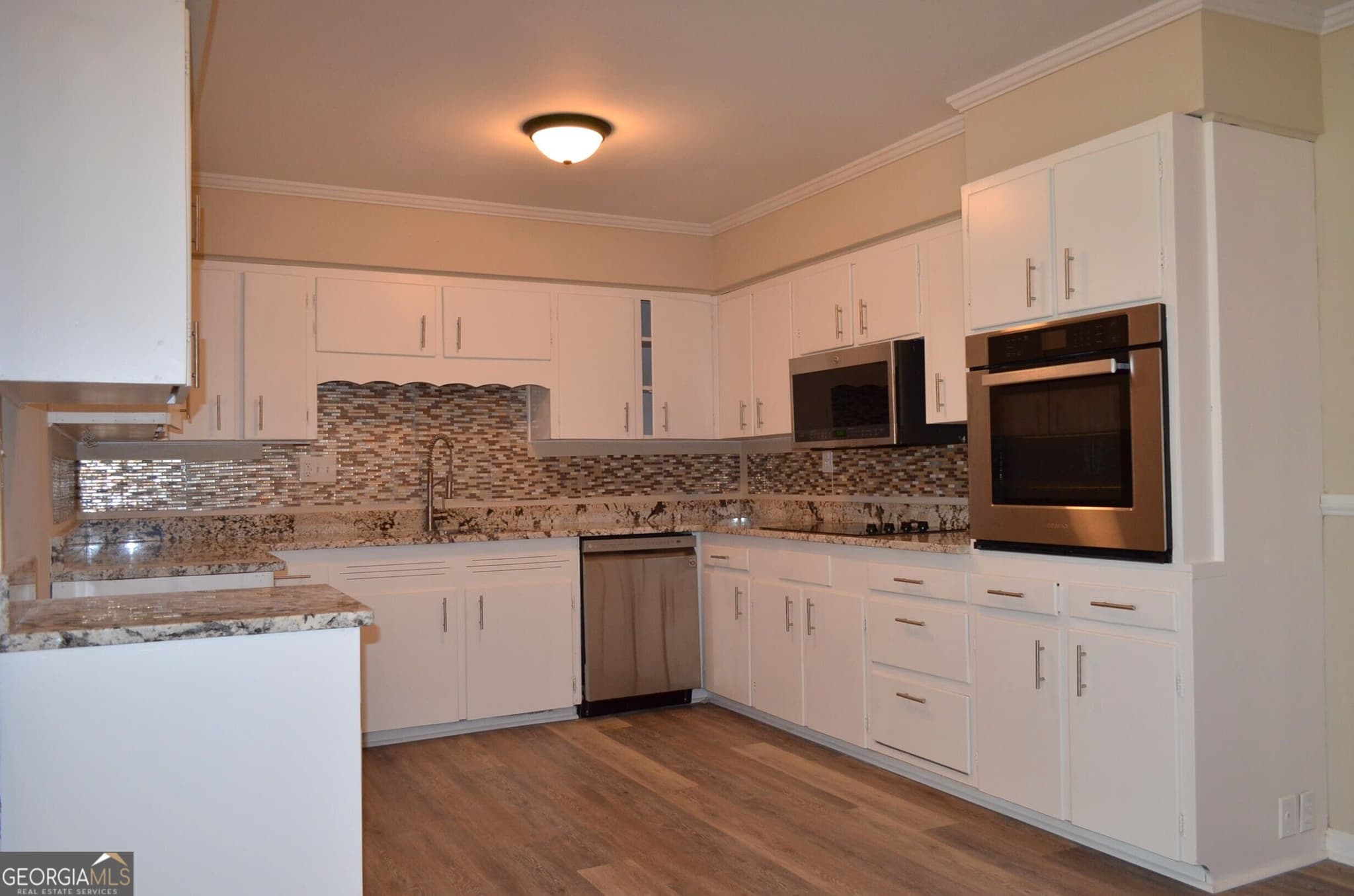 5 bedroom, 3.5 bathroom, 3,380 sq ft single family residence for sale at 29 Mimms Street, Reynolds, GA 31076 — photo 6