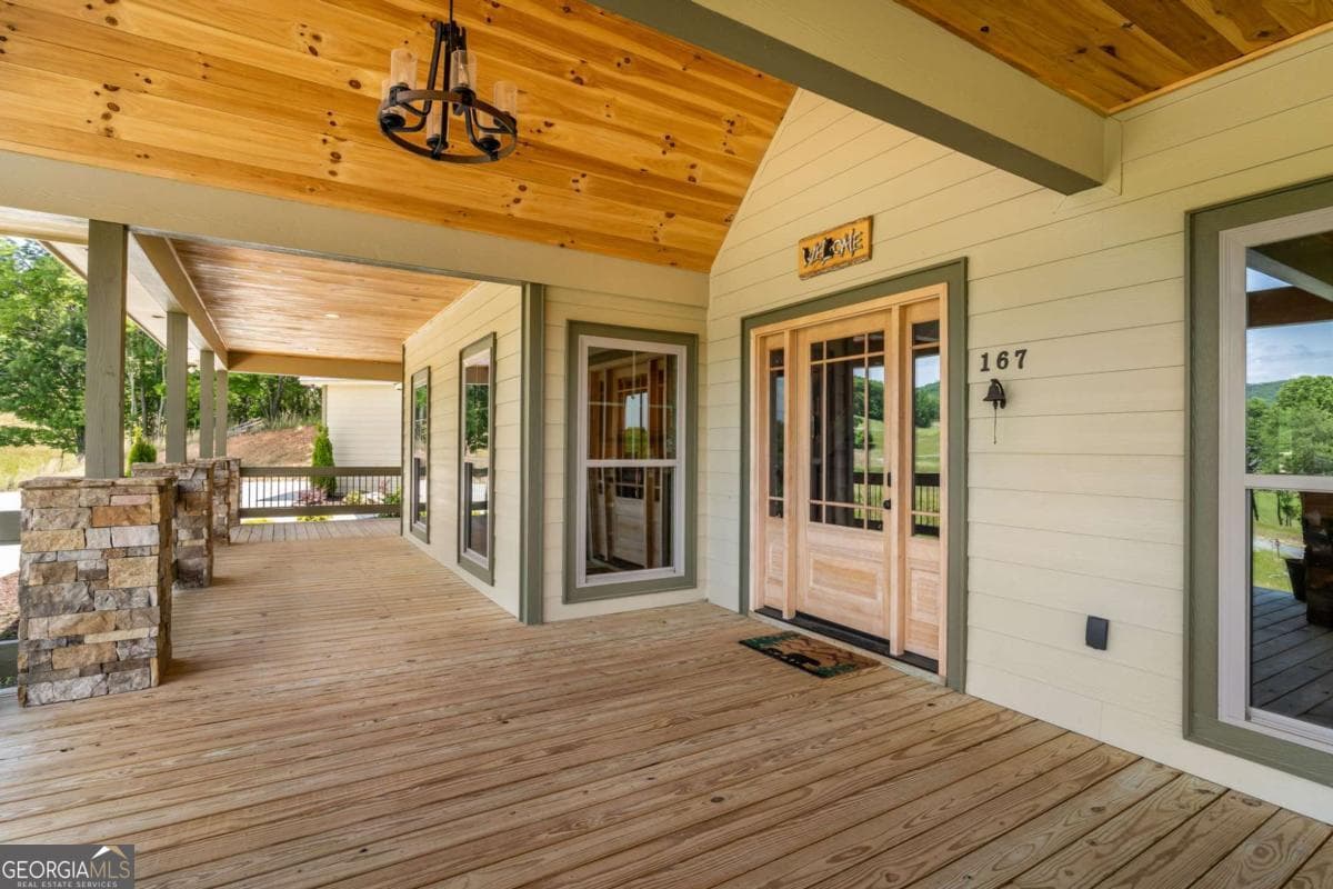 4 bedroom, 3.5 bathroom, 3,270 sq ft cabin,single family residence for sale at 167 Big Valley Overlook, Morganton, GA 30560 — photo 6