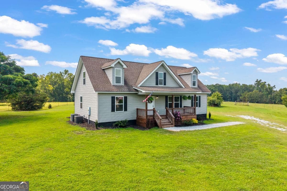 4 bedroom, 3 bathroom, 2,447 sq ft single family residence for sale at 1718 Ed Bennett Road, Nicholson, GA 30565 — photo 2