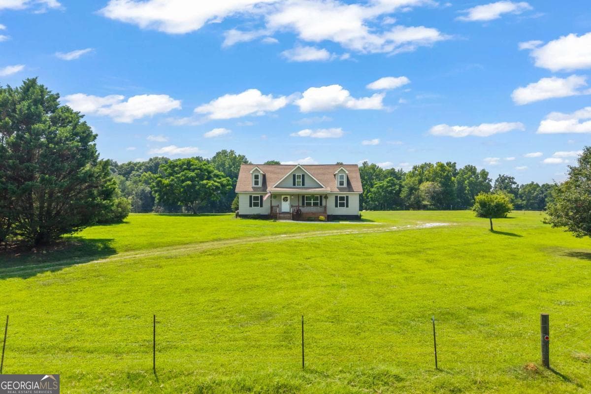4 bedroom, 3 bathroom, 2,447 sq ft single family residence for sale at 1718 Ed Bennett Road, Nicholson, GA 30565 — photo 4