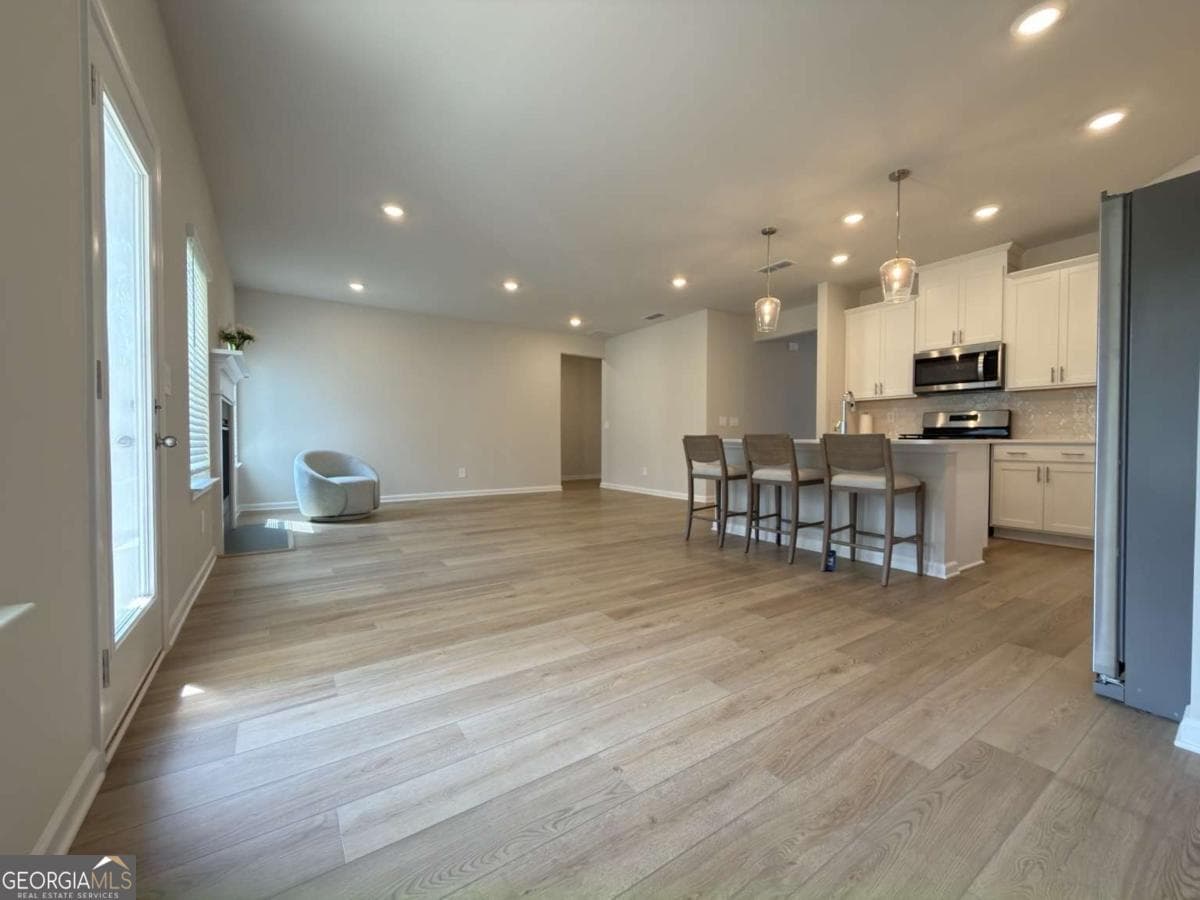 5 bedroom, 3 bathroom single family residence for sale at 2414 Martin Spring Bend, Lawrenceville, GA 30045 — photo 7