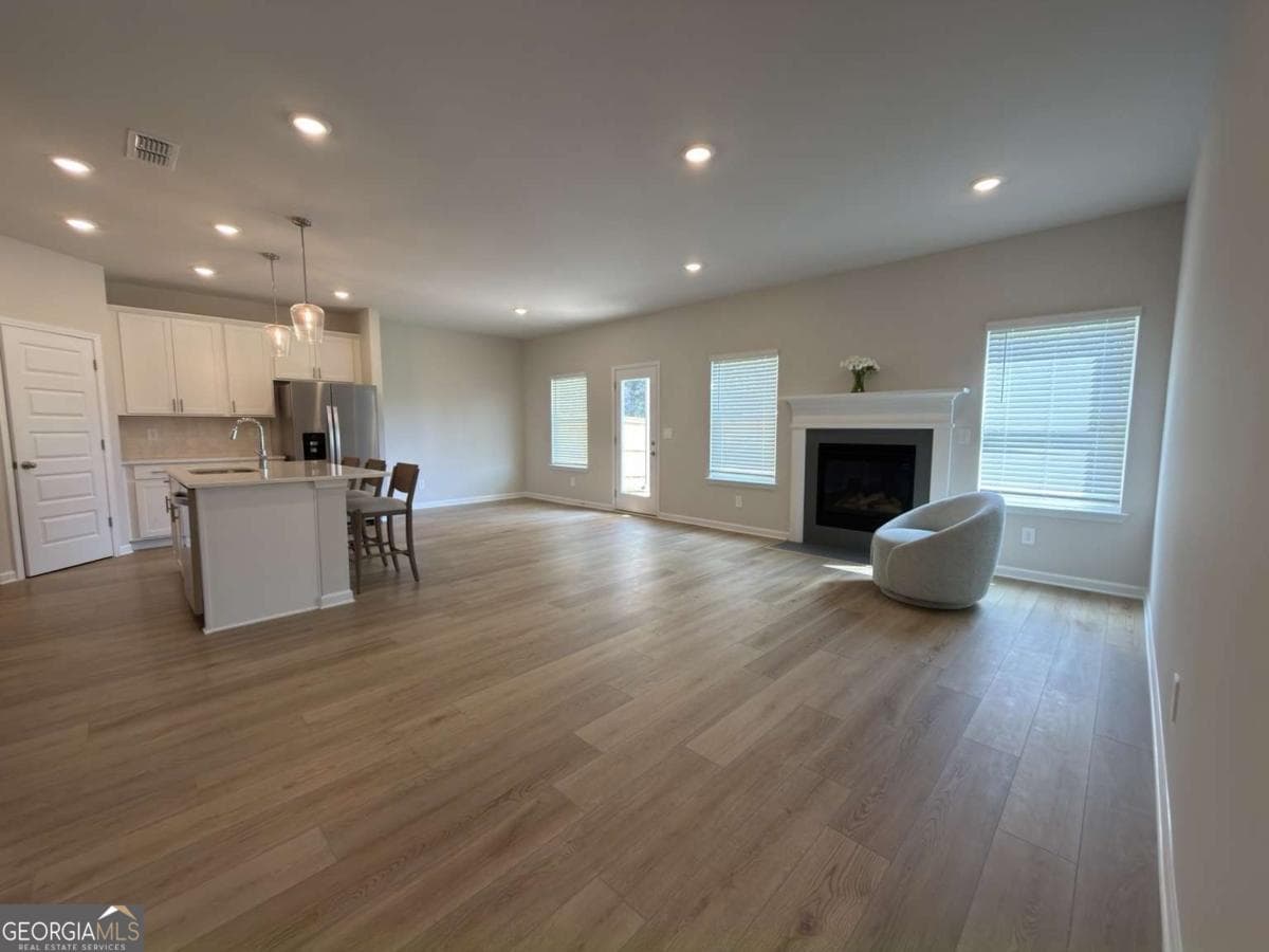 5 bedroom, 3 bathroom single family residence for sale at 2414 Martin Spring Bend, Lawrenceville, GA 30045 — photo 5
