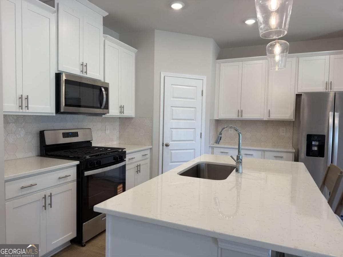 5 bedroom, 3 bathroom single family residence for sale at 2414 Martin Spring Bend, Lawrenceville, GA 30045 — photo 10
