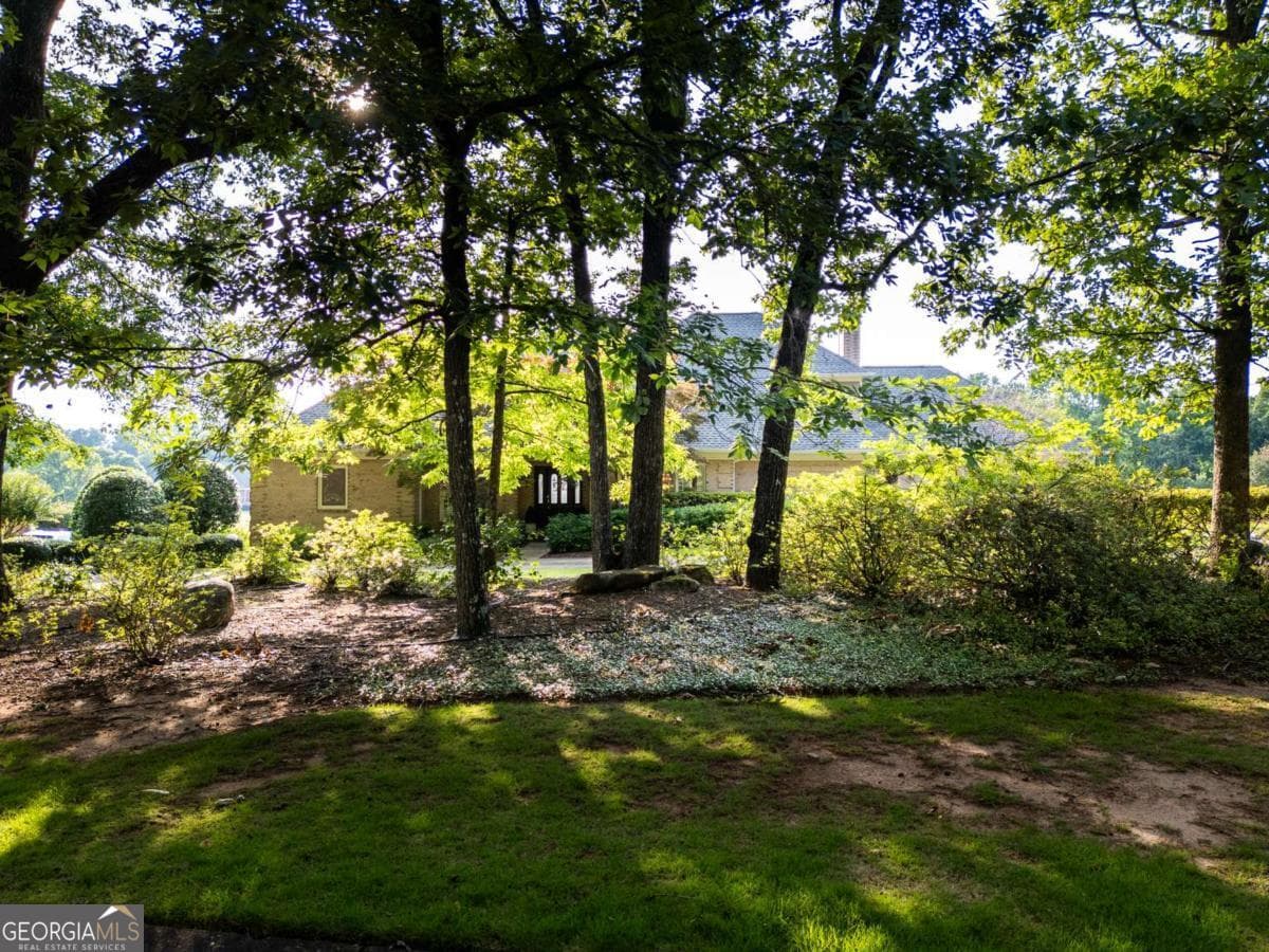 3 bedroom, 3.5 bathroom, 3,446 sq ft single family residence for sale at 1010 Forrest Hills Point, Watkinsville, GA 30677 — photo 2