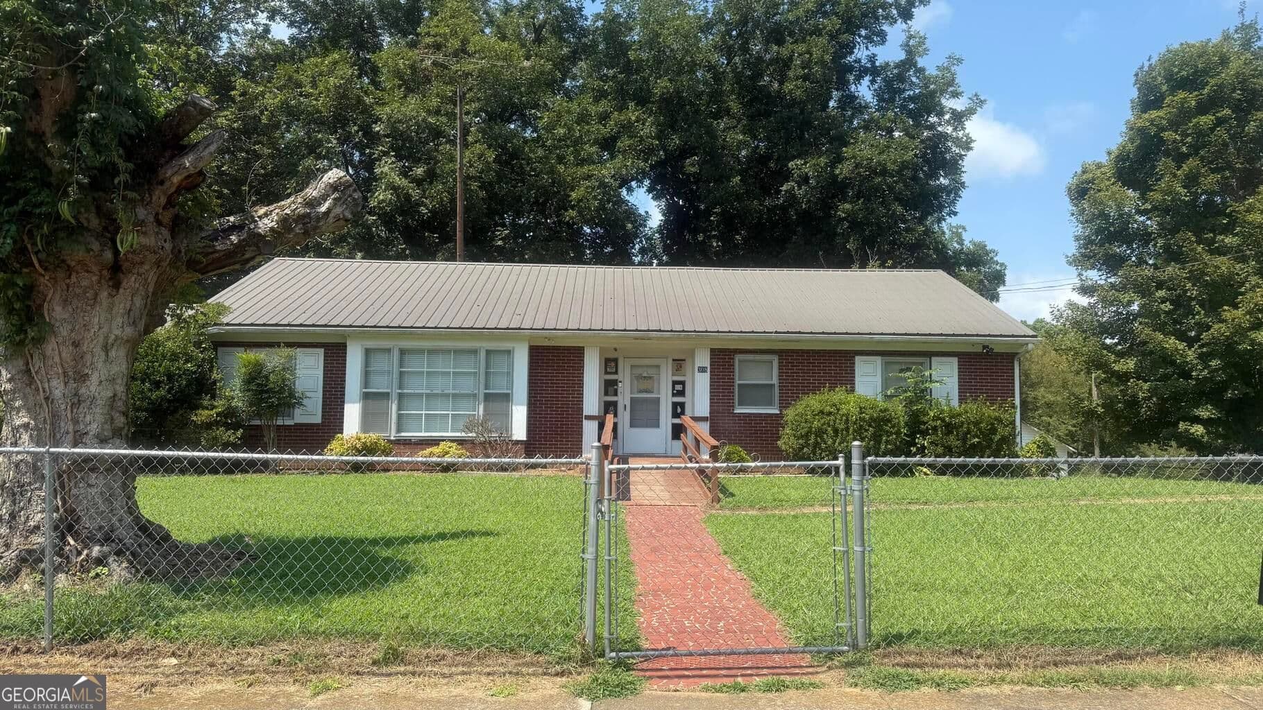 3 bedroom, 2 bathroom, 1,931 sq ft single family residence under contract at 308 S Cherokee Street, Lafayette, GA 30728