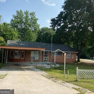 4 bedroom, 2 bathroom, 1,314 sq ft single family residence for sale at 213 Whipporwill Way, Riverdale, GA 30274 — photo 1 of 11