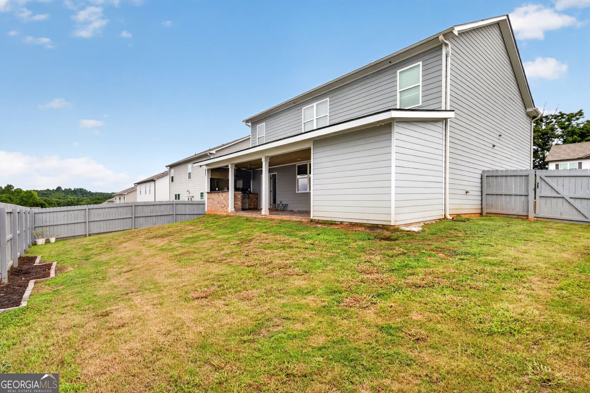 5 bedroom, 3 bathroom, 2,610 sq ft single family residence for sale at 359 Walnut Grove Way, Pendergrass, GA 30567 — photo 8