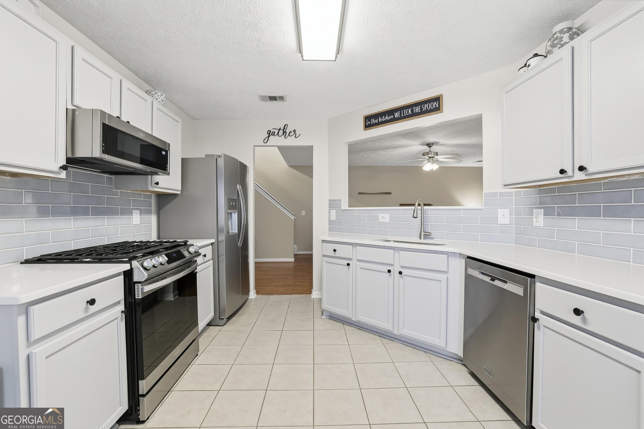 3 bedroom, 2.5 bathroom, 1,848 sq ft single family residence for sale at 313 Westminster Drive, Canton, GA 30114 — photo 2