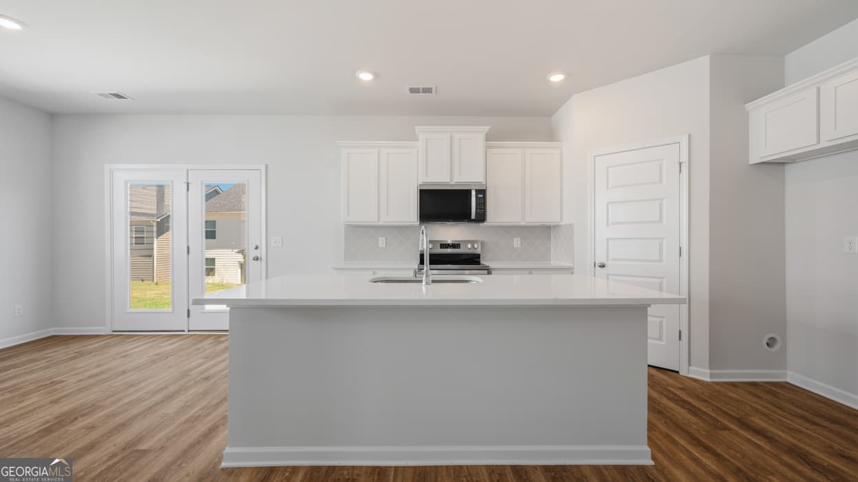 4 bedroom, 2.5 bathroom single family residence for sale at 11979 Aukerman Way, Hampton, GA 30228 — photo 10