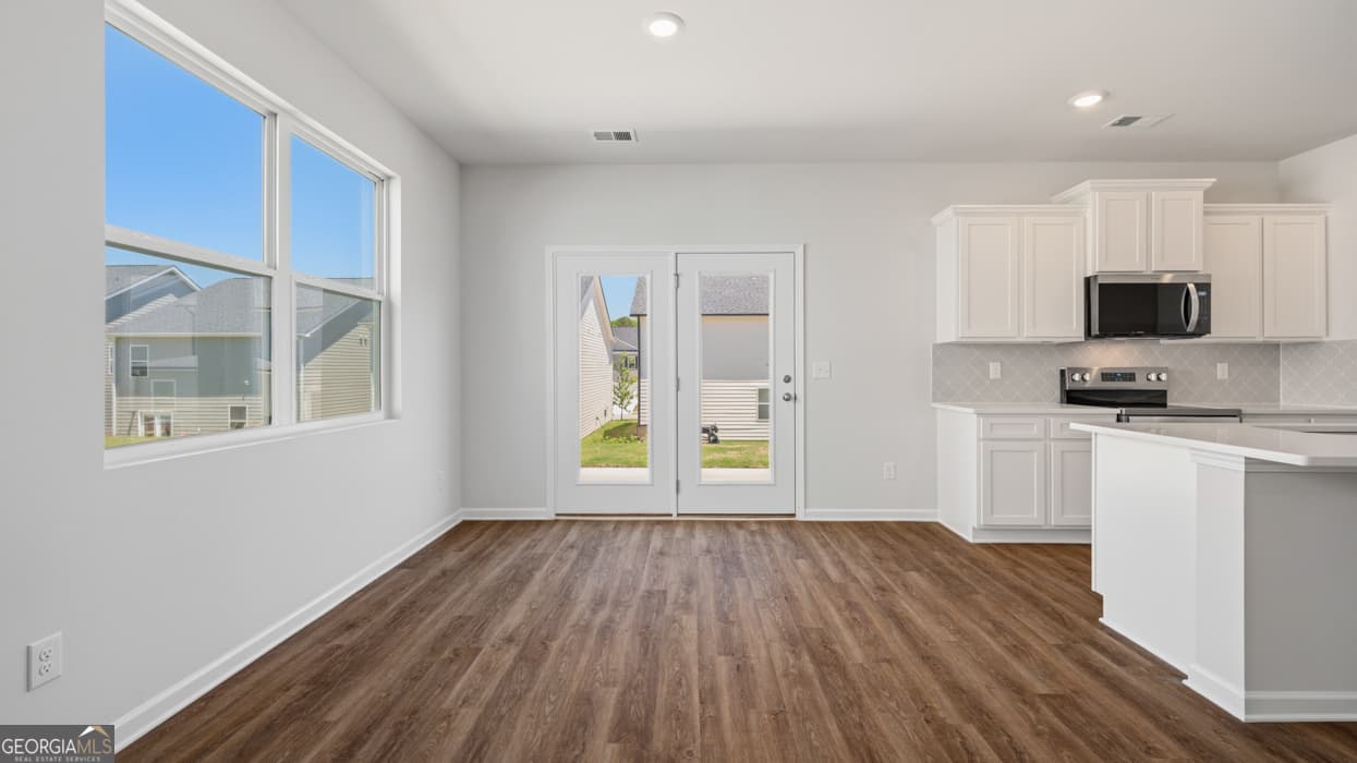 4 bedroom, 2.5 bathroom single family residence for sale at 11979 Aukerman Way, Hampton, GA 30228 — photo 8