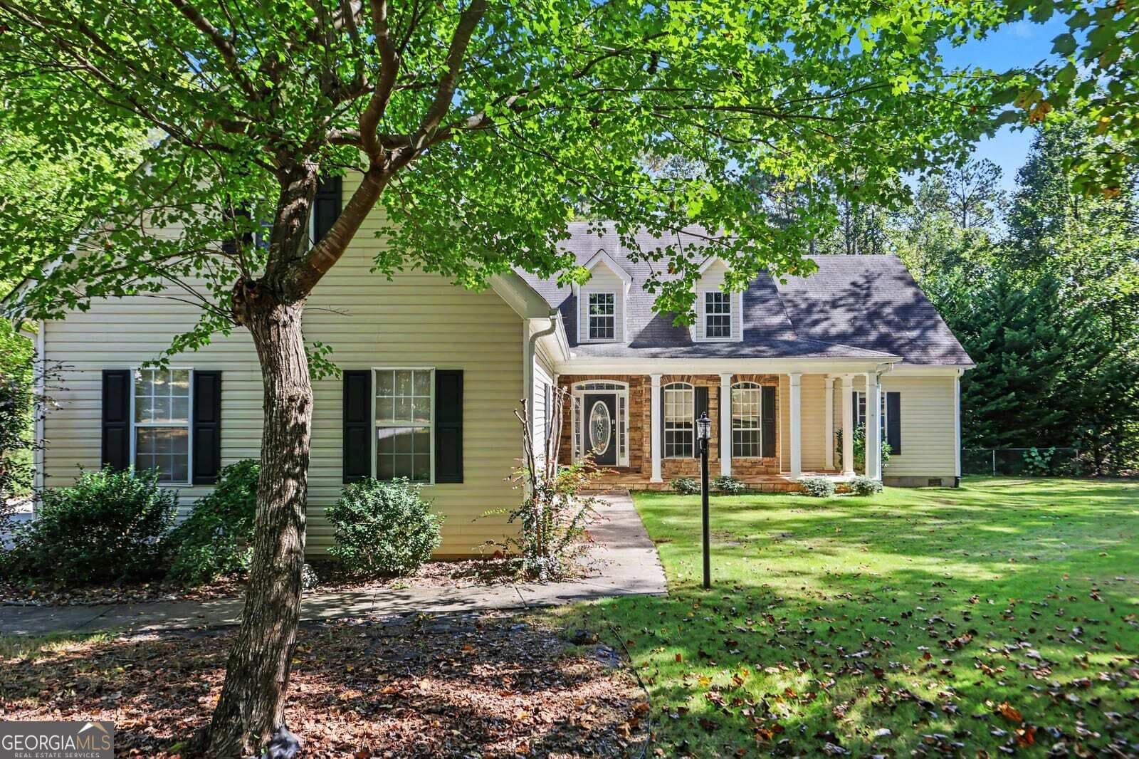4 bedroom, 3 bathroom, 2,625 sq ft single family residence for sale at 6940 FLETCHER Drive, Winston, GA 30187 — photo 1 of 39