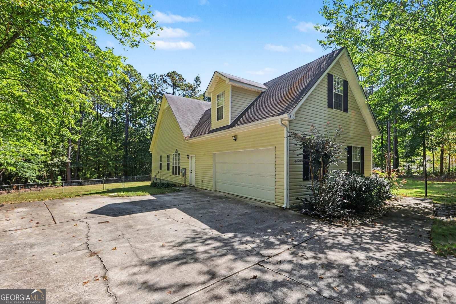 4 bedroom, 3 bathroom, 2,625 sq ft single family residence for sale at 6940 FLETCHER Drive, Winston, GA 30187 — photo 4