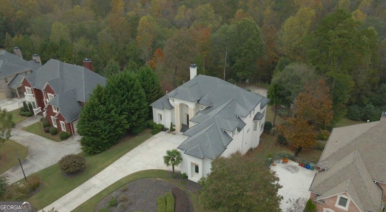 6 bedroom, 4.5 bathroom, 7,321 sq ft single family residence for sale at 4446 Thurgood Estate Drive, Ellenwood, GA 30294 — photo 2