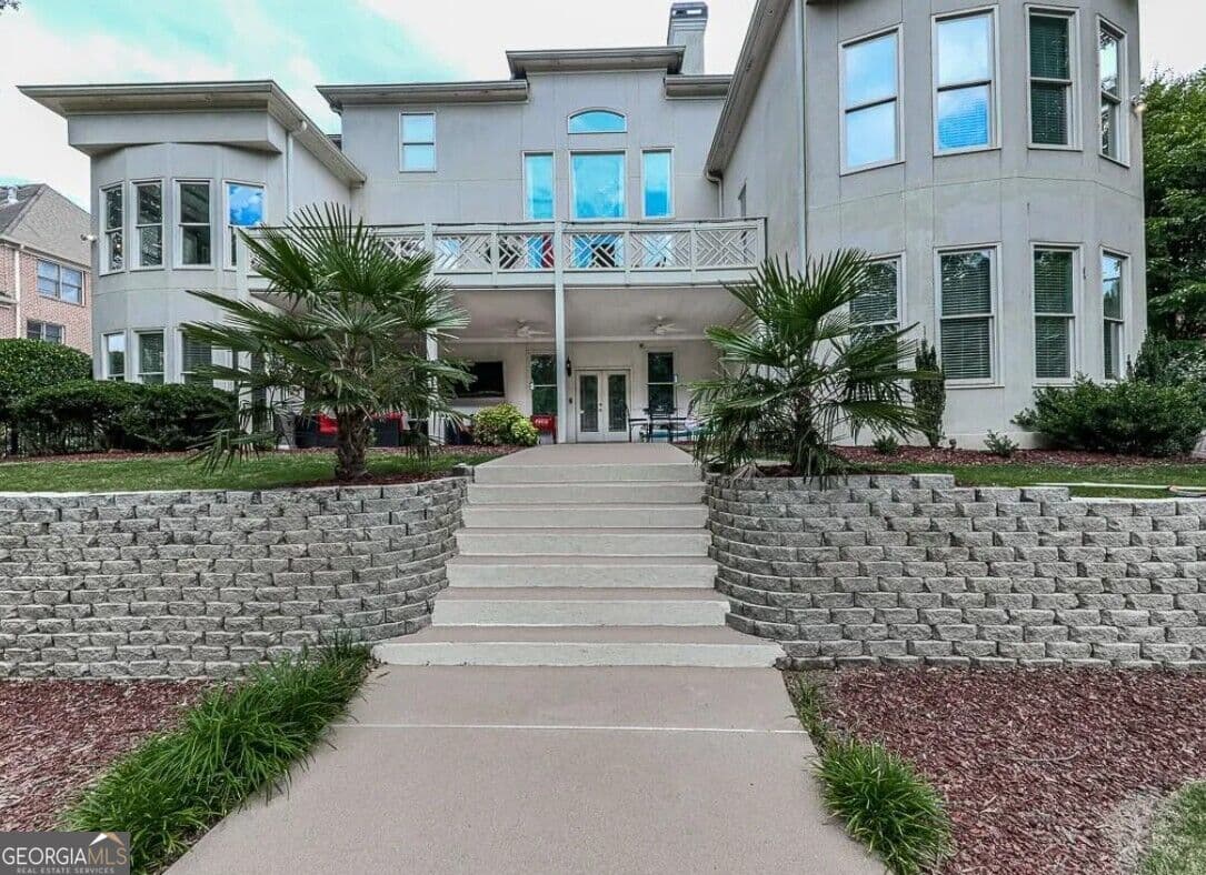 6 bedroom, 4.5 bathroom, 7,321 sq ft single family residence for sale at 4446 Thurgood Estate Drive, Ellenwood, GA 30294 — photo 3