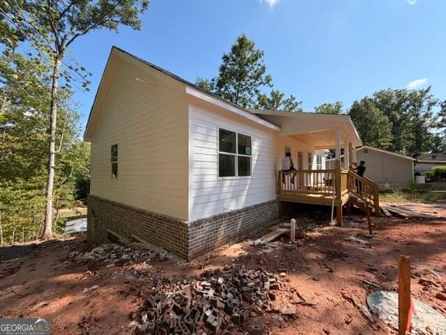 3 bedroom, 2 bathroom, 1,375 sq ft single family residence for sale at 119 Bluegill Run, Eatonton, GA 31024 — photo 2