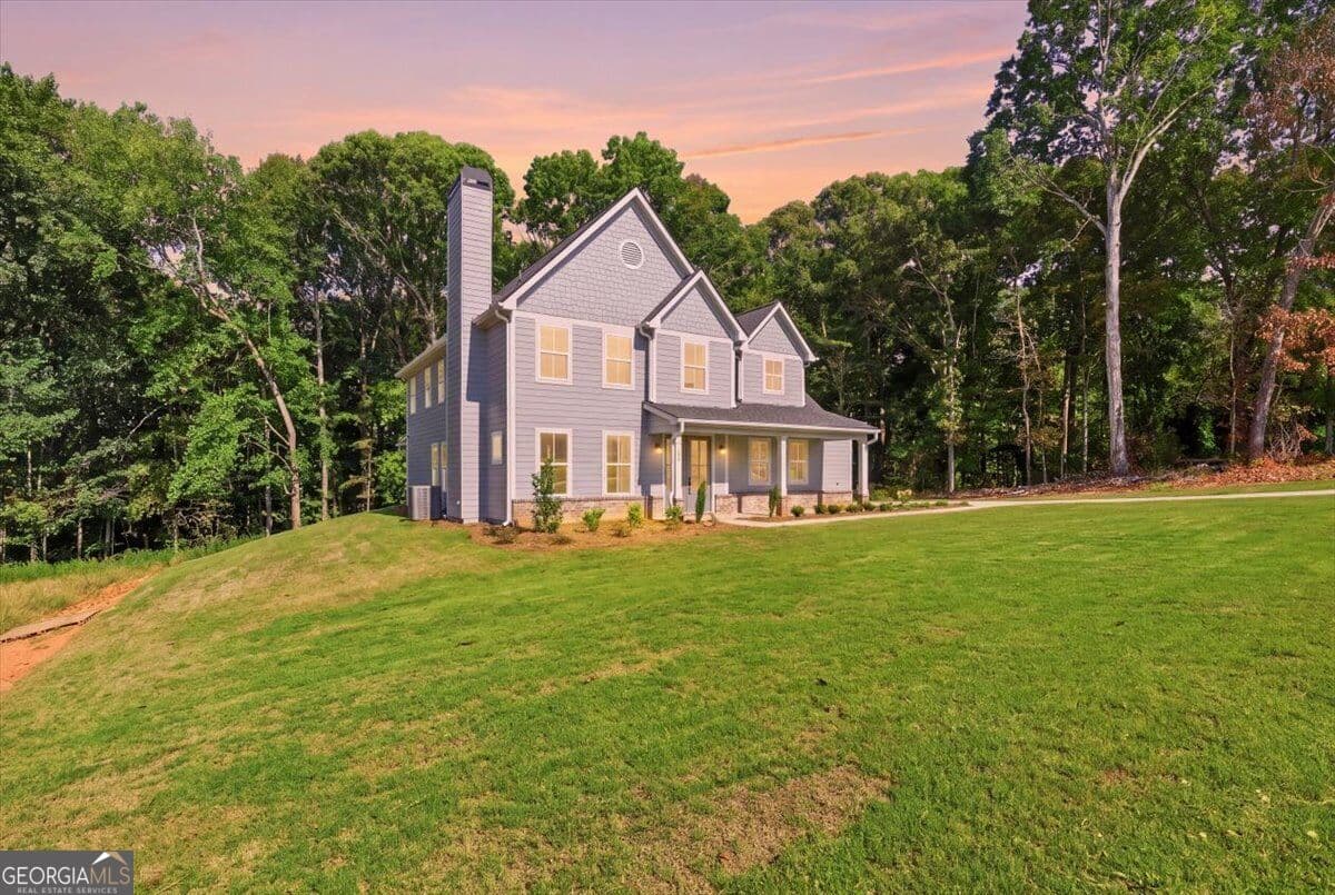 4 bedroom, 3.5 bathroom single family residence for sale at 124 Maney Drive, Statham, GA 30666 — photo 3