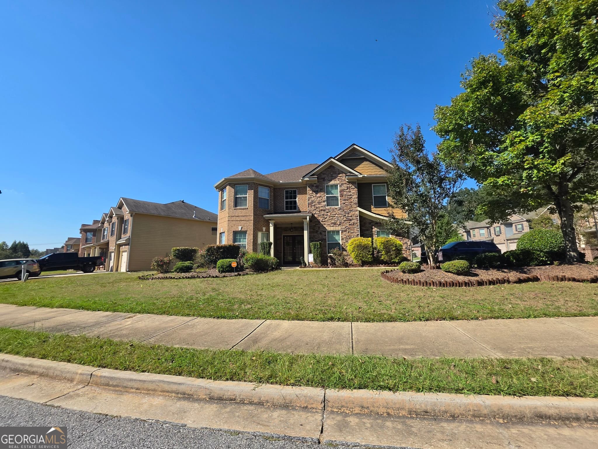 4 bedroom, 2.5 bathroom, 3,402 sq ft single family residence for sale at 7502 Bowhead Court, Fairburn, GA 30213 — photo 4
