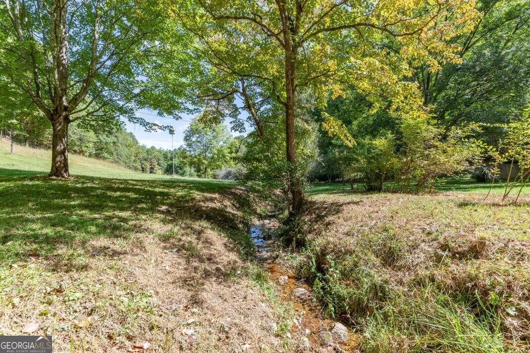 6 bedroom, 4.5 bathroom, 5,286 sq ft single family residence for sale at 1016 Mull Road, Morganton, GA 30560 — photo 6