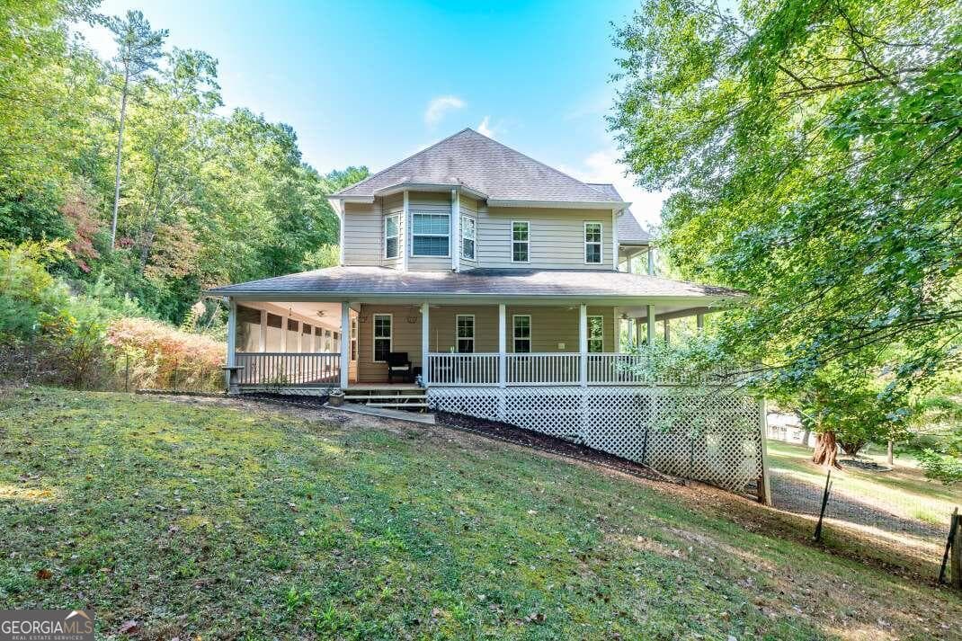 6 bedroom, 4.5 bathroom, 5,286 sq ft single family residence for sale at 1016 Mull Road, Morganton, GA 30560 — photo 3