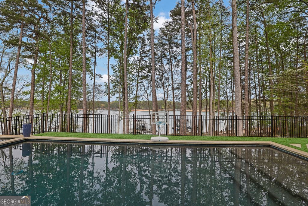 7 bedroom, 6.5 bathroom, 6,434 sq ft single family residence for sale at 6093 Shadburn Ferry Road, Buford, GA 30518 — photo 9
