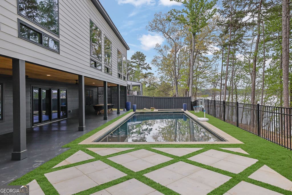 7 bedroom, 6.5 bathroom, 6,434 sq ft single family residence for sale at 6093 Shadburn Ferry Road, Buford, GA 30518 — photo 10