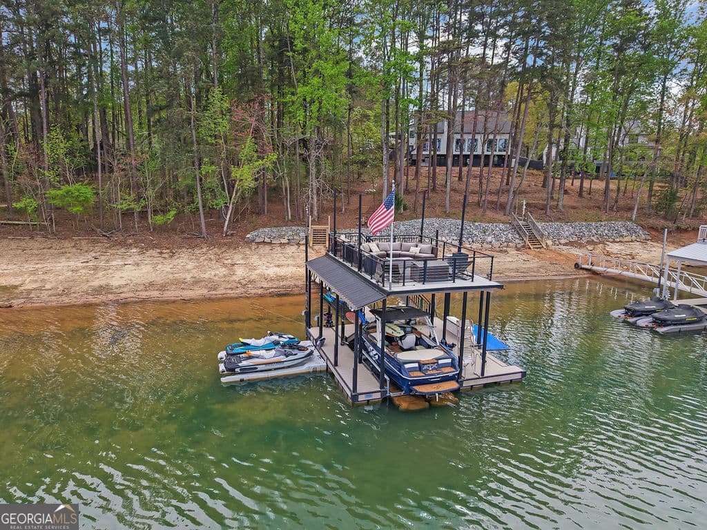 7 bedroom, 6.5 bathroom, 6,434 sq ft single family residence for sale at 6093 Shadburn Ferry Road, Buford, GA 30518 — photo 8