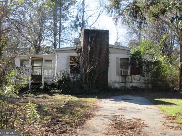 3 bedroom, 2 bathroom, 1,152 sq ft manufactured home,single family residence for sale at 59 Skyland Drive, Locust Grove, GA 30248 — photo 2