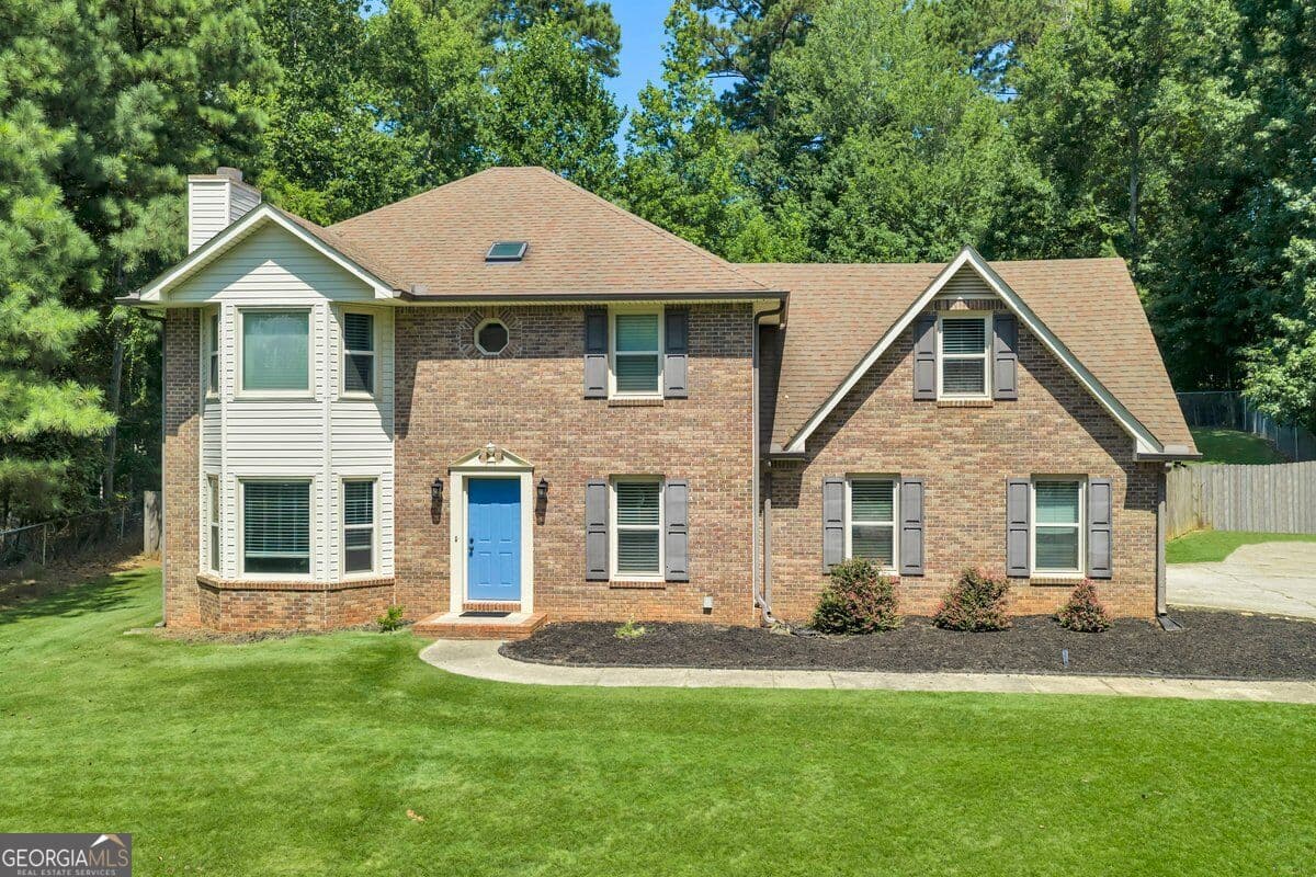 3 bedroom, 2.5 bathroom, 2,416 sq ft single family residence for sale at 125 Newberry Street, Fayetteville, GA 30215 — photo 1 of 53