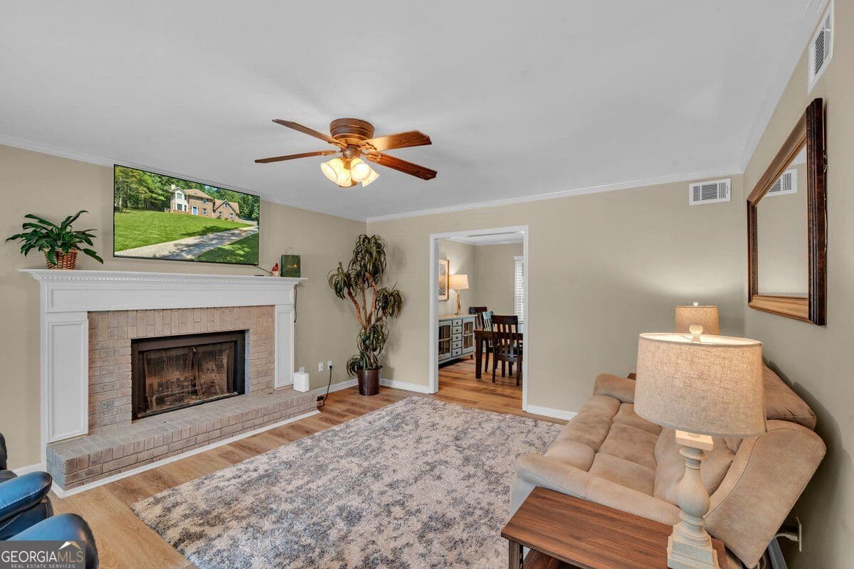 3 bedroom, 2.5 bathroom, 2,416 sq ft single family residence for sale at 125 Newberry Street, Fayetteville, GA 30215 — photo 4