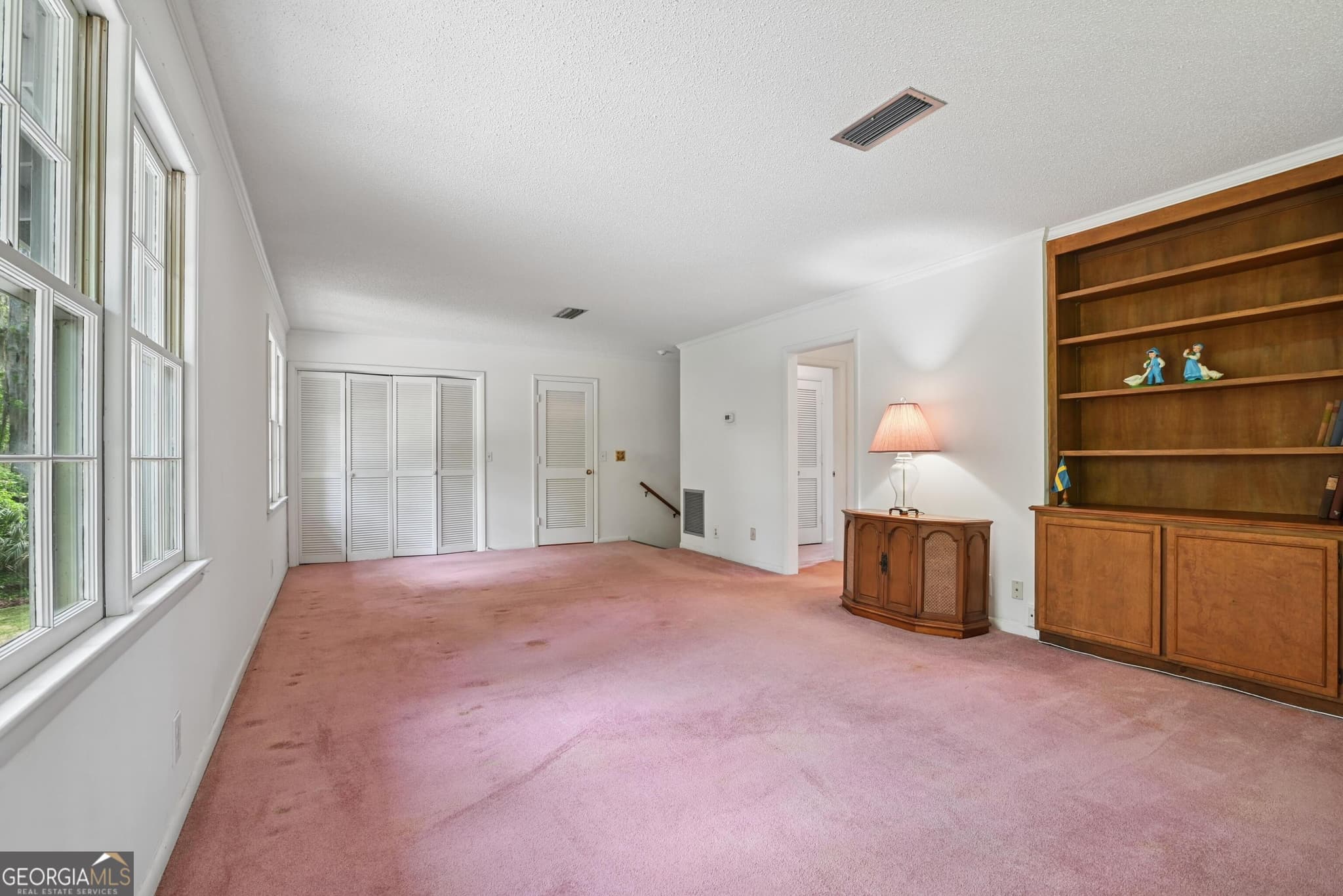 4 bedroom, 2.5 bathroom, 2,991 sq ft single family residence for sale at 180 Saint Clair Drive, St. Simons, GA 31522 — photo 4