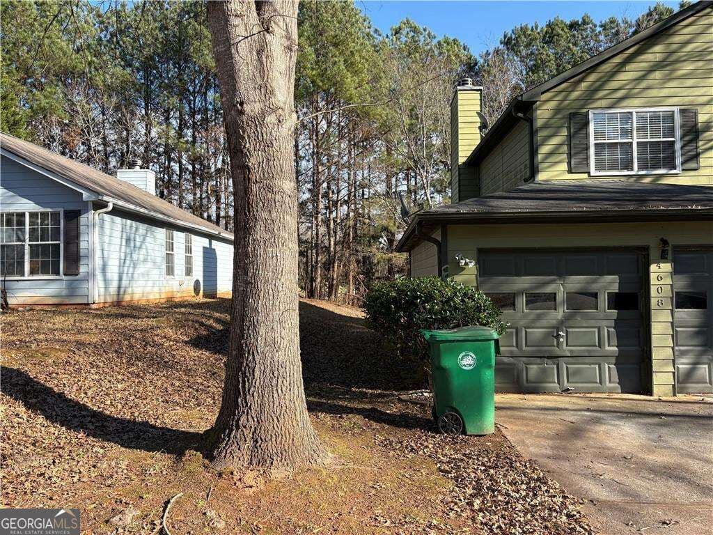 3 bedroom, 2 bathroom, 1,527 sq ft single family residence for sale at 4608 Latchwood Drive, Lithonia, GA 30038 — photo 2