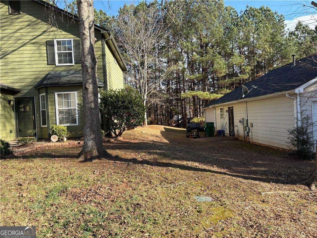 3 bedroom, 2 bathroom, 1,527 sq ft single family residence for sale at 4608 Latchwood Drive, Lithonia, GA 30038 — photo 3