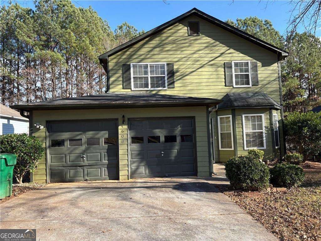 3 bedroom, 2 bathroom, 1,527 sq ft single family residence for sale at 4608 Latchwood Drive, Lithonia, GA 30038 — photo 1 of 5