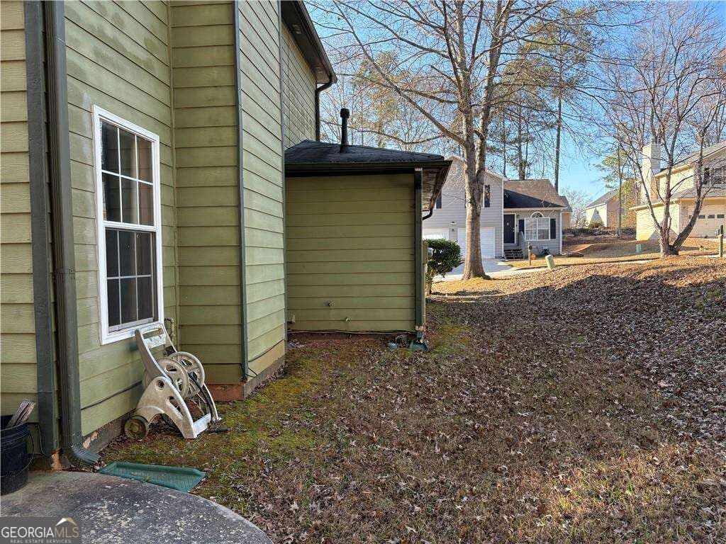 3 bedroom, 2 bathroom, 1,527 sq ft single family residence for sale at 4608 Latchwood Drive, Lithonia, GA 30038 — photo 4