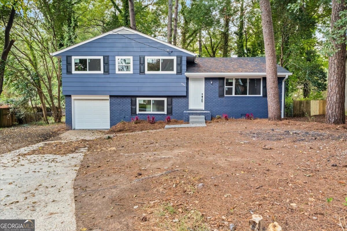3 bedroom, 2 bathroom, 1,201 sq ft single family residence for sale at 1730 Salina Drive, Jonesboro, GA 30236 — photo 2