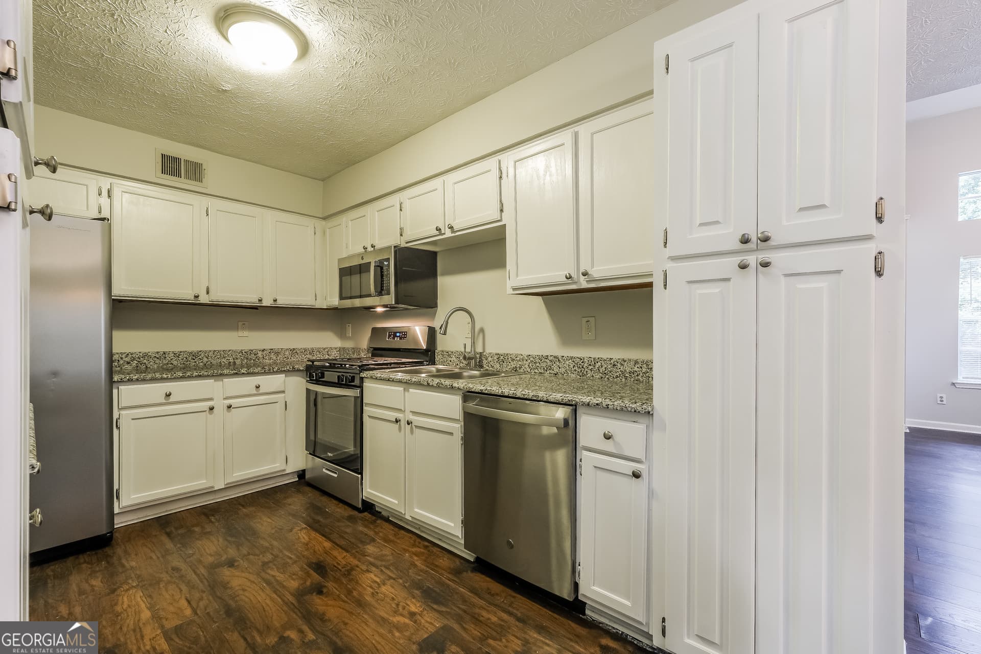 3 bedroom, 2.5 bathroom, 1,626 sq ft single family residence for sale at 1701 Ivy Glenn Road, Decatur, GA 30032 — photo 8
