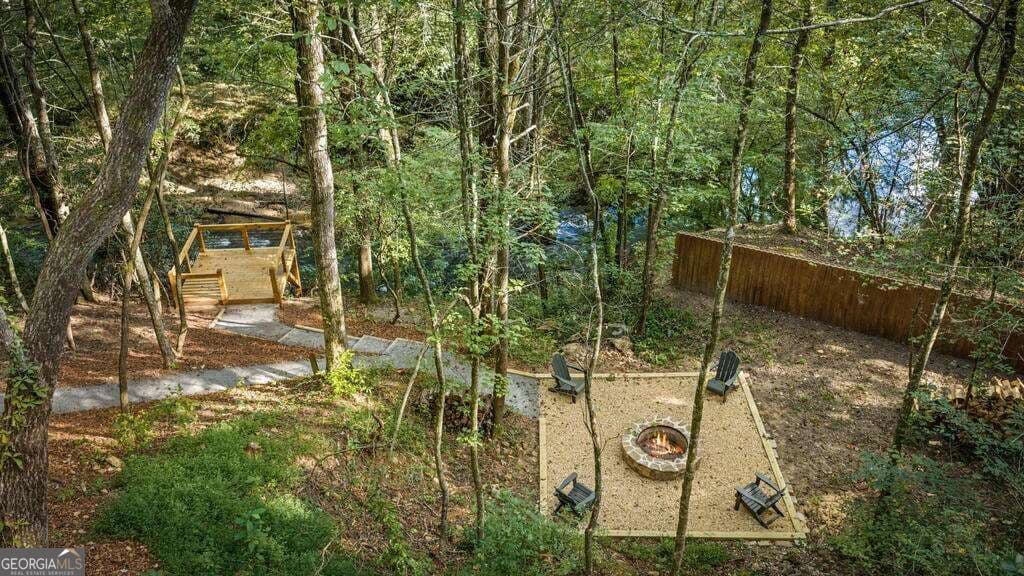 3 bedroom, 3 bathroom, 2,188 sq ft cabin,single family residence for sale at 66 Woodland Trail, Epworth, GA 30541 — photo 7