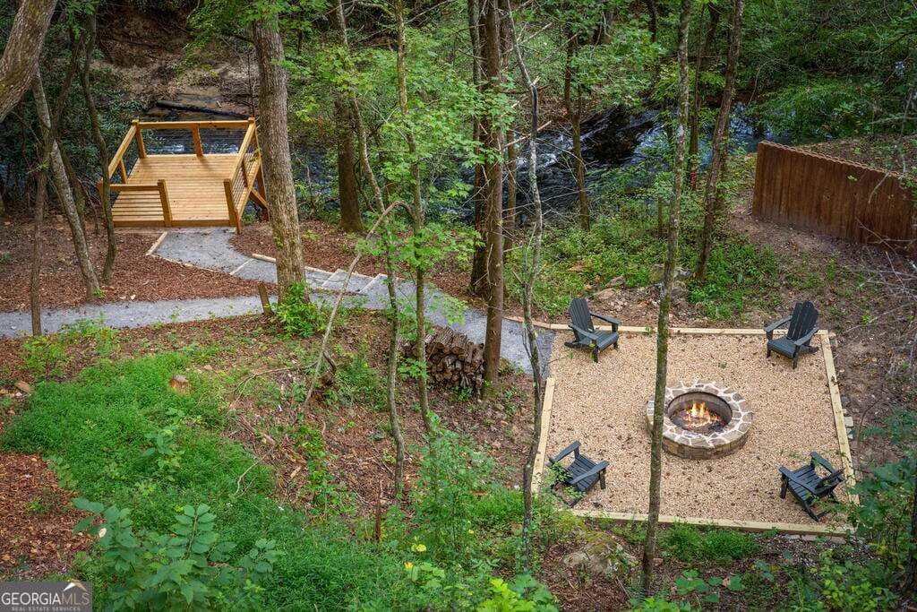 3 bedroom, 3 bathroom, 2,188 sq ft cabin,single family residence for sale at 66 Woodland Trail, Epworth, GA 30541 — photo 8