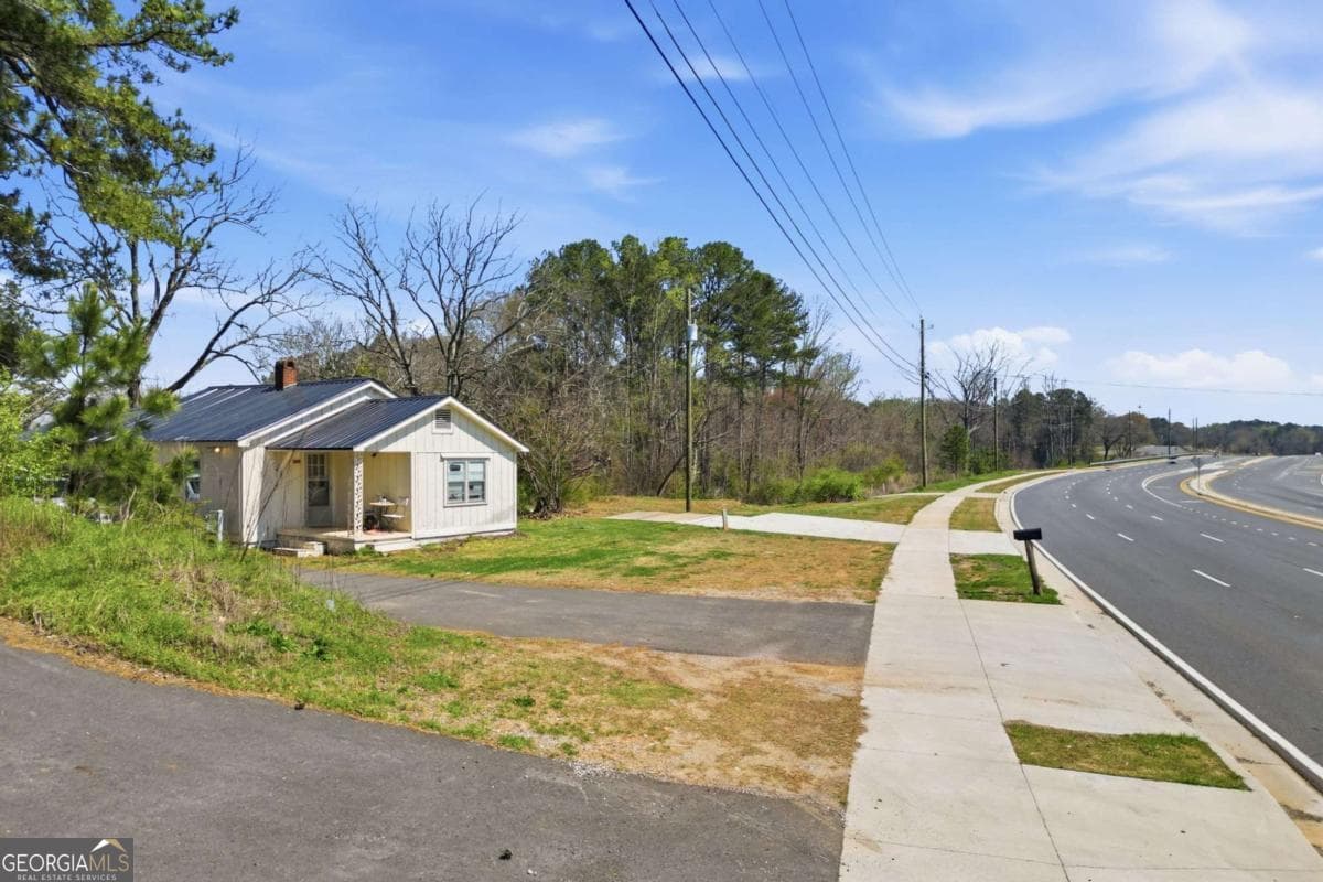 residential lot for sale at 3823 Cumming Highway, Canton, GA 30115 — photo 2