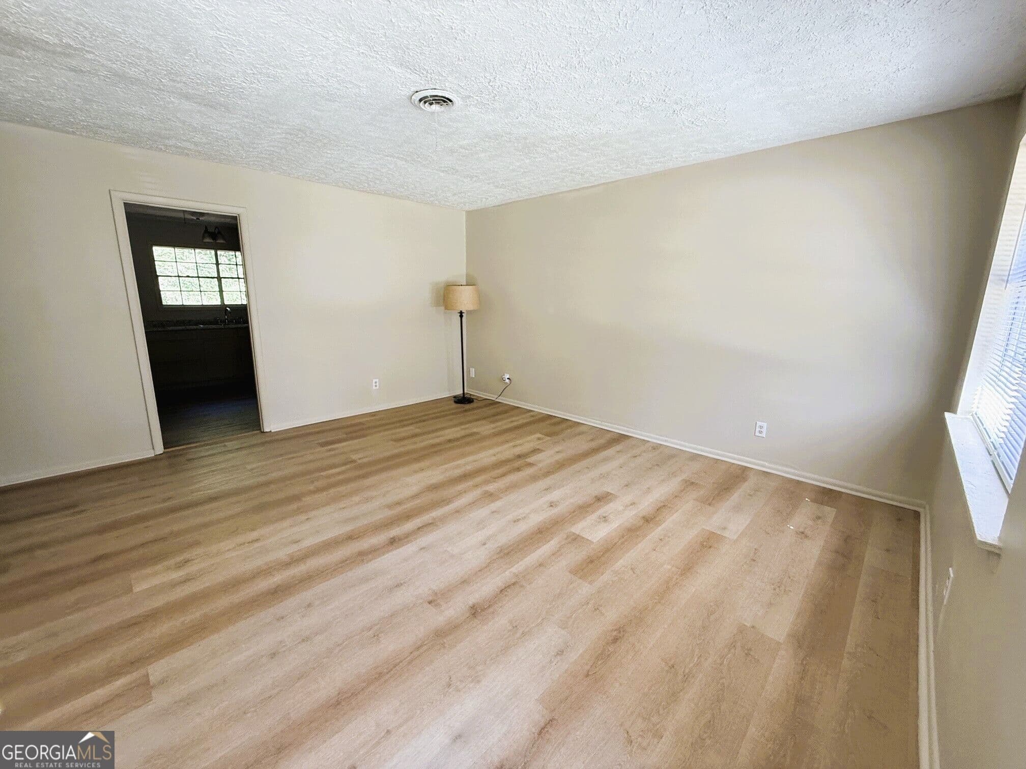 3 bedroom, 1.5 bathroom, 1,188 sq ft single family residence for sale at 1056 Green Meadow Drive, Madison, GA 30650 — photo 3