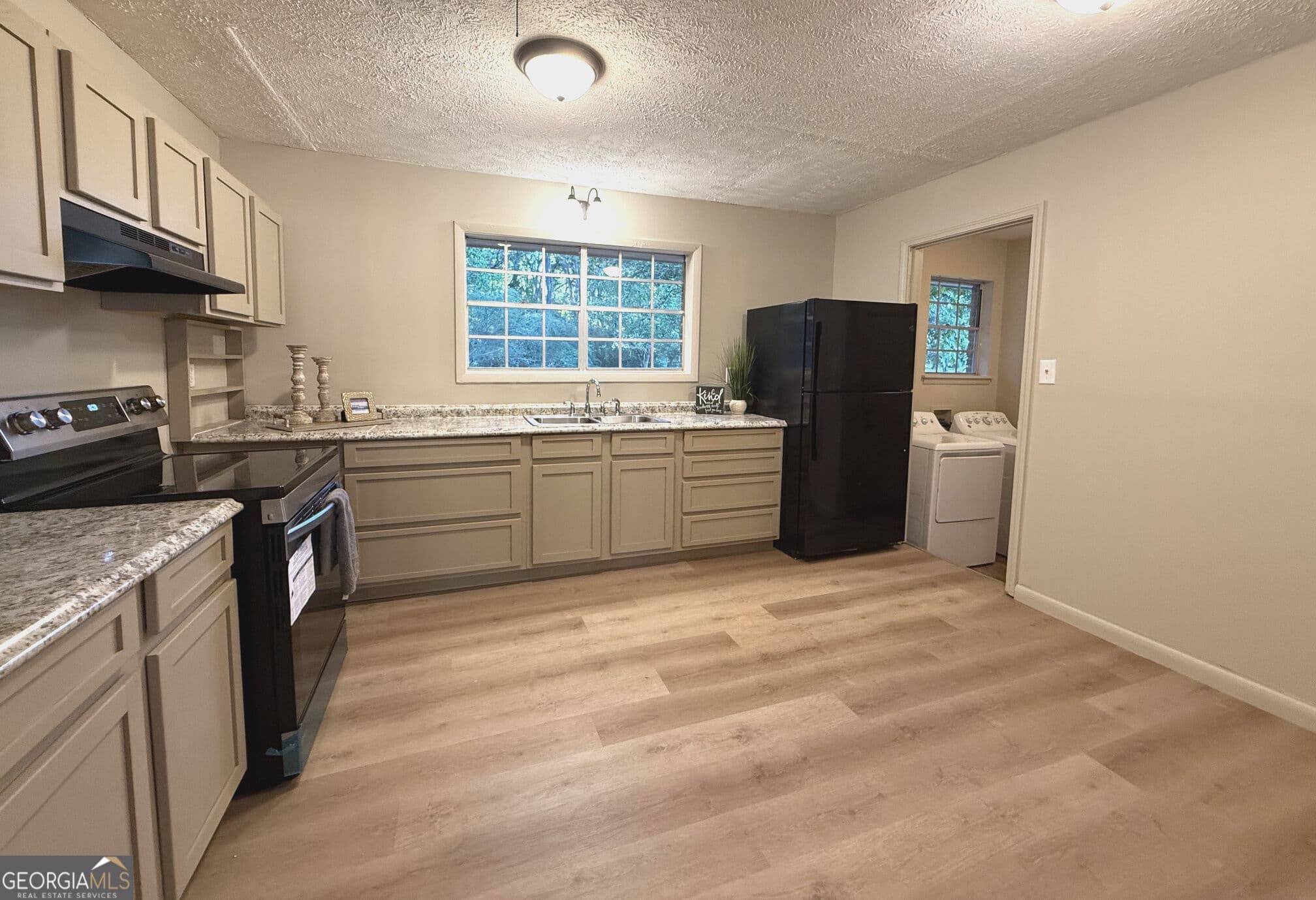 3 bedroom, 1.5 bathroom, 1,188 sq ft single family residence for sale at 1056 Green Meadow Drive, Madison, GA 30650 — photo 5