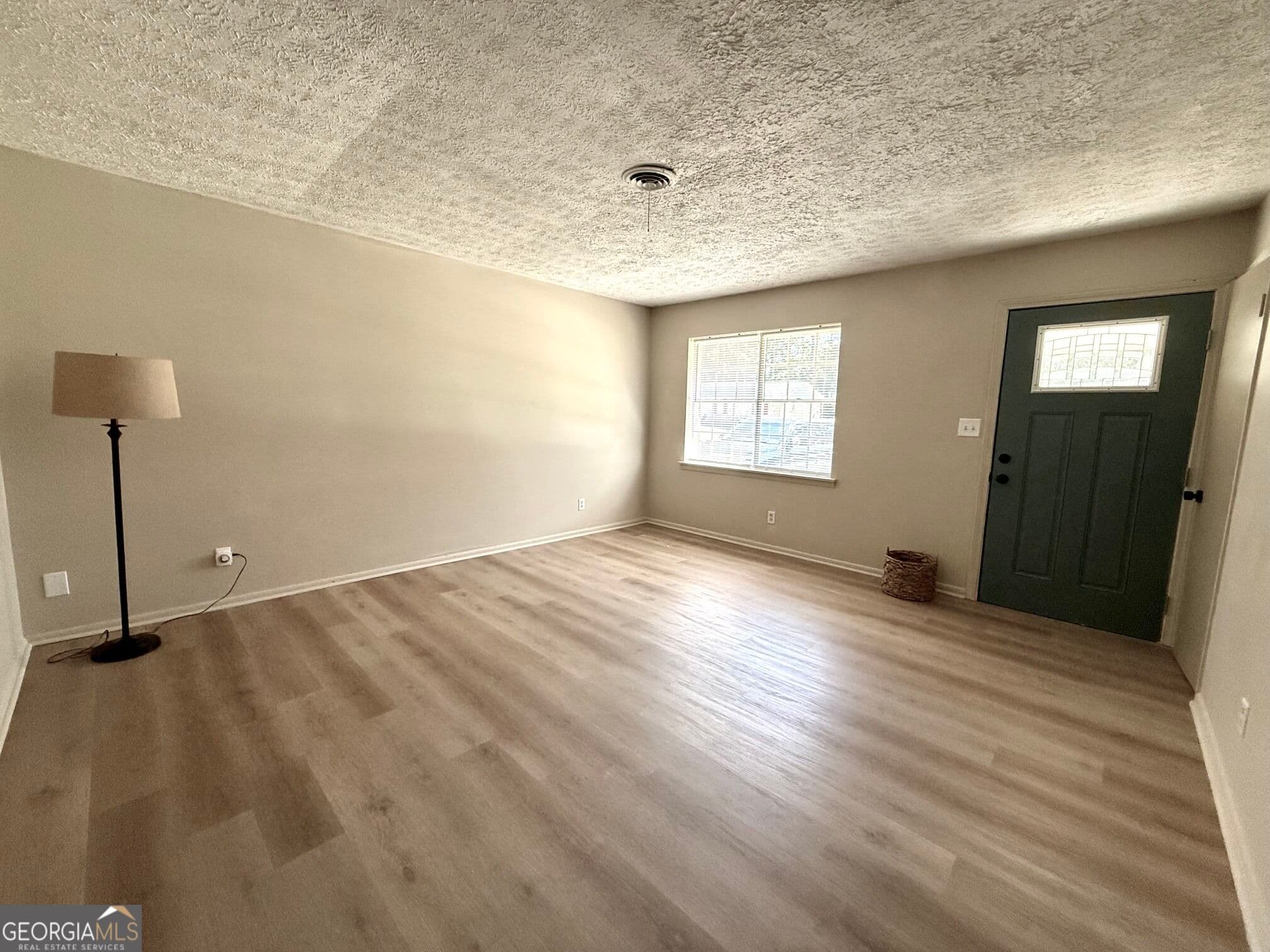3 bedroom, 1.5 bathroom, 1,188 sq ft single family residence for sale at 1056 Green Meadow Drive, Madison, GA 30650 — photo 4