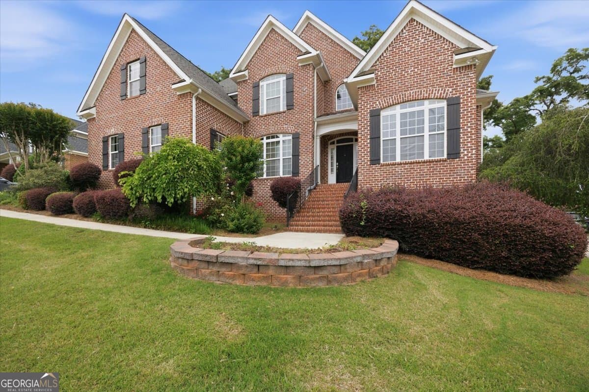 6 bedroom, 5 bathroom, 5,035 sq ft single family residence for sale at 134 Broadleaf Drive, Macon, GA 31210 — photo 1 of 44