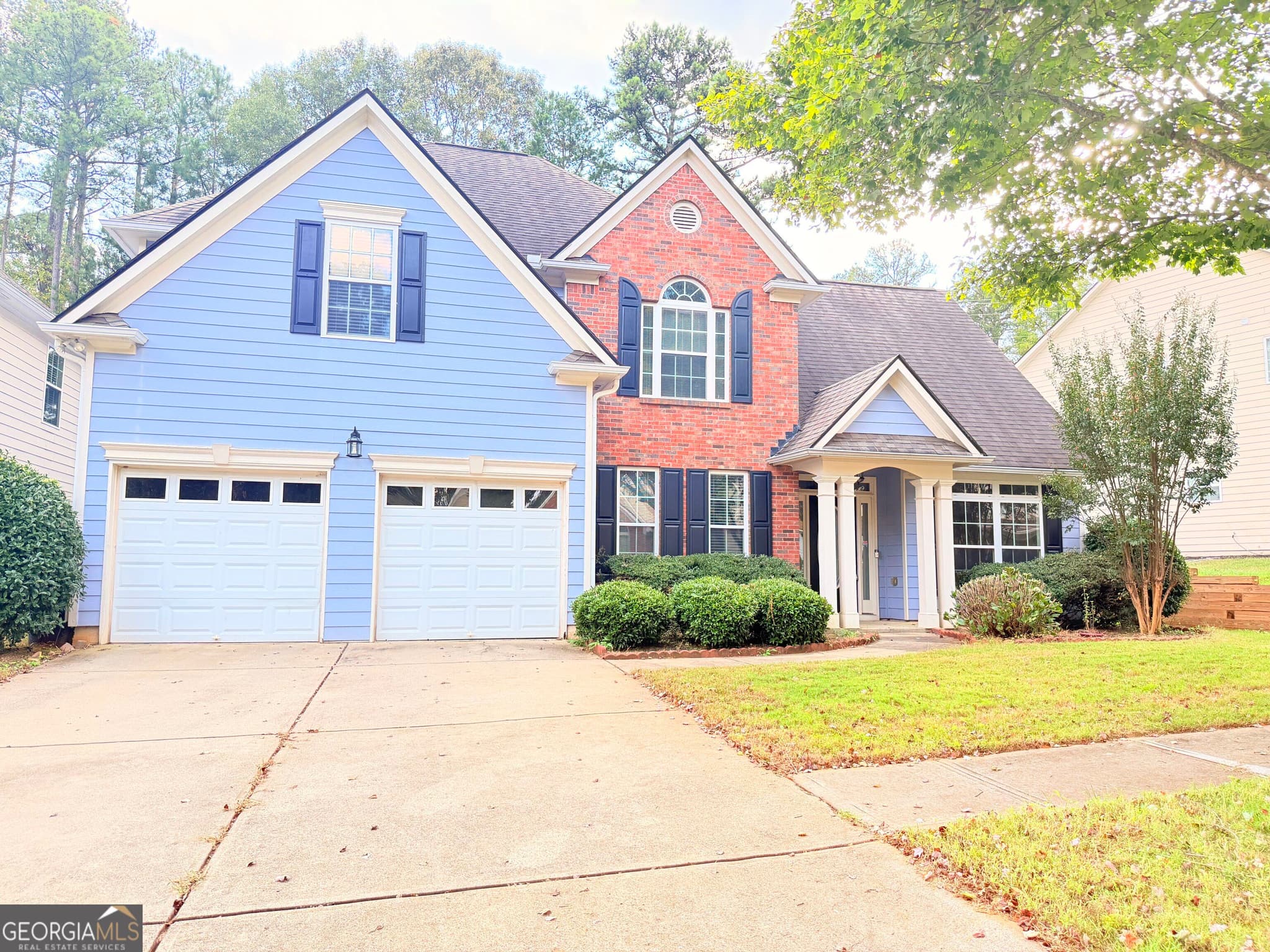 5 bedroom, 3 bathroom, 2,339 sq ft single family residence for sale at 1185 Martins Down Drive, Lawrenceville, GA 30045