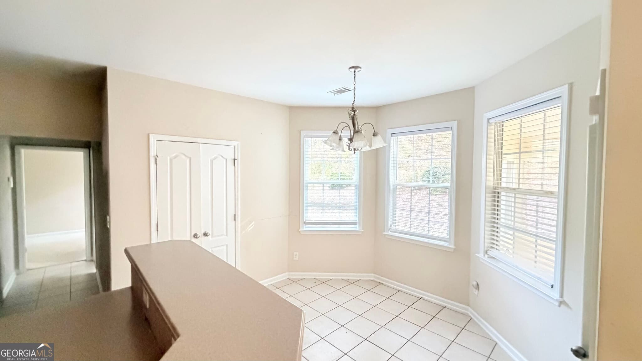 5 bedroom, 3 bathroom, 2,339 sq ft single family residence for sale at 1185 Martins Down Drive, Lawrenceville, GA 30045 — photo 5